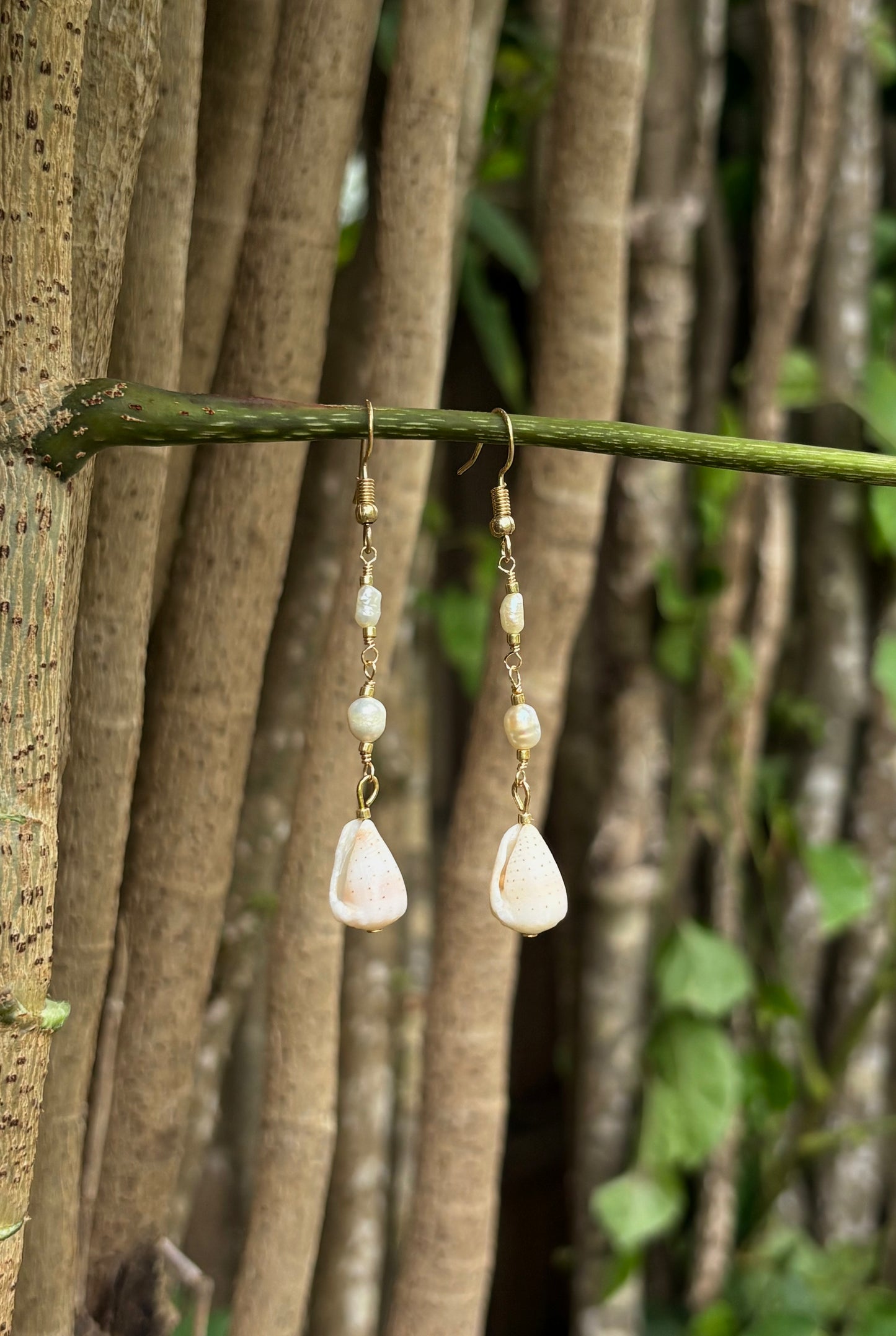 twin pearl cone earrings