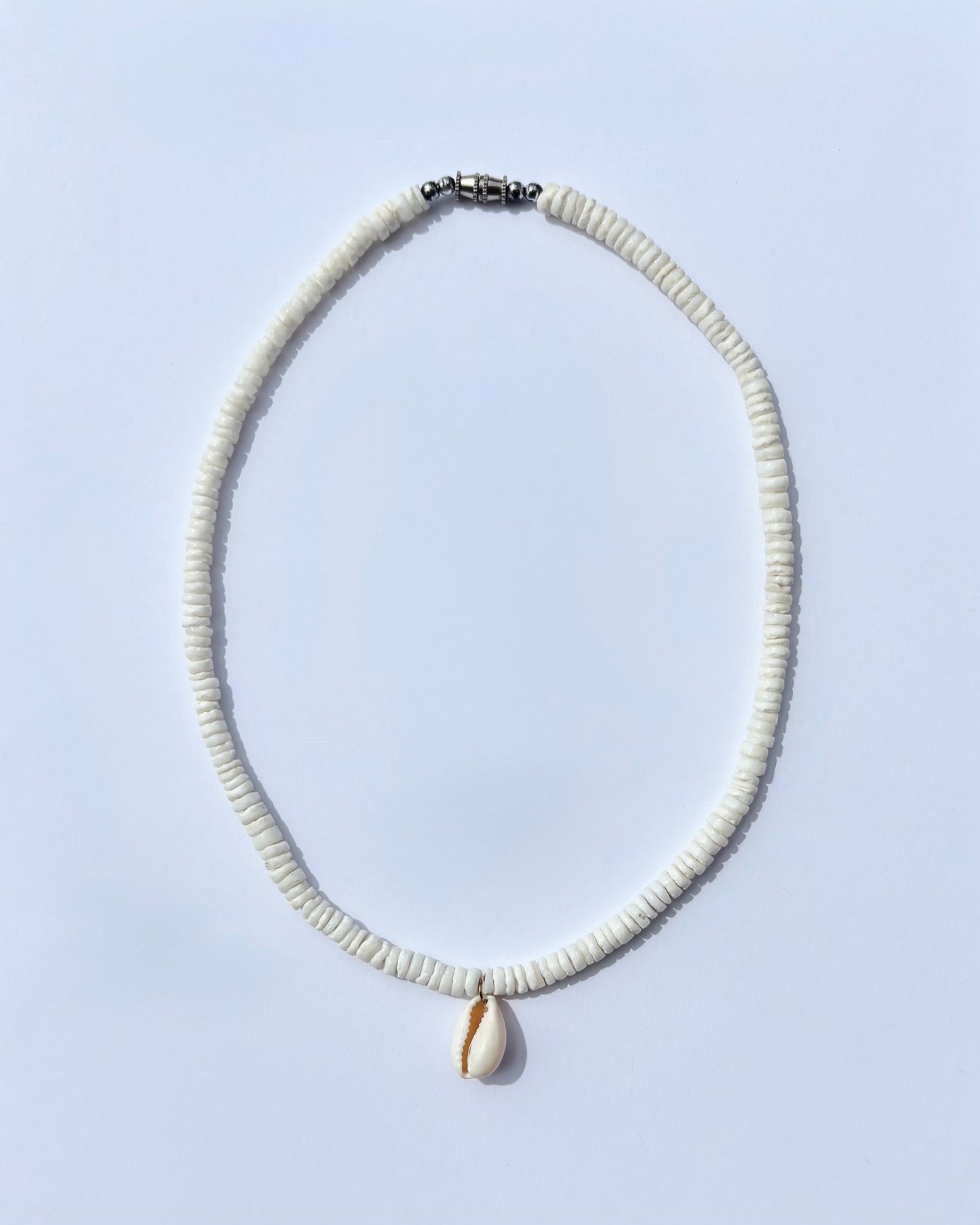 puka shell cowrie necklace